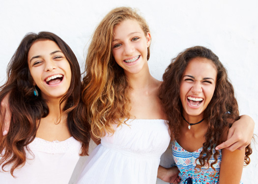 Confident Holden patient smiling with friends