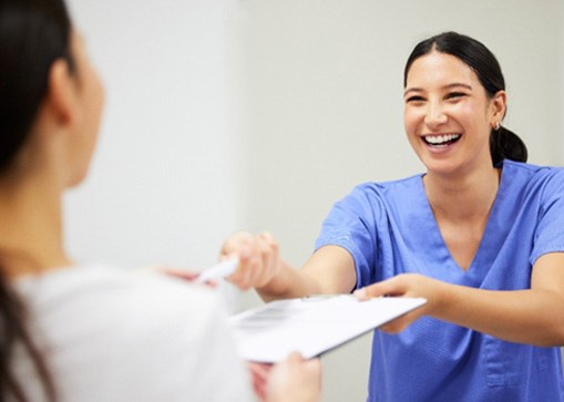 woman talking to patients 