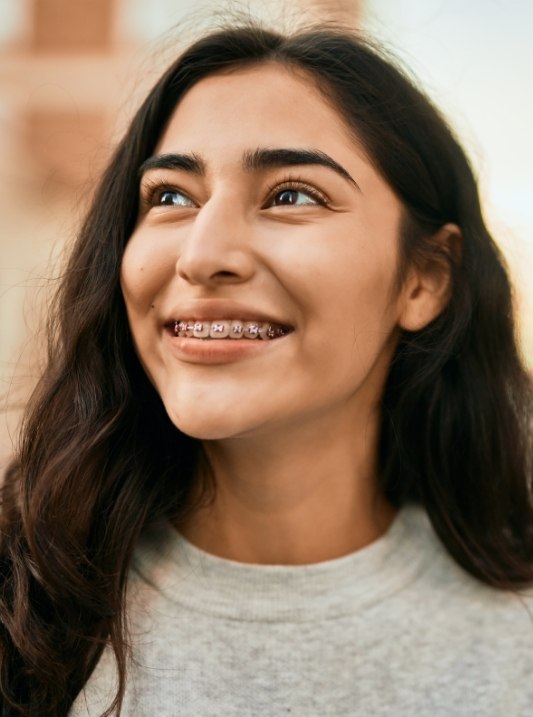 Woman smiling with braces