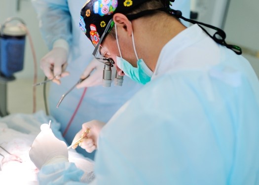Orthodontist performing surgery
